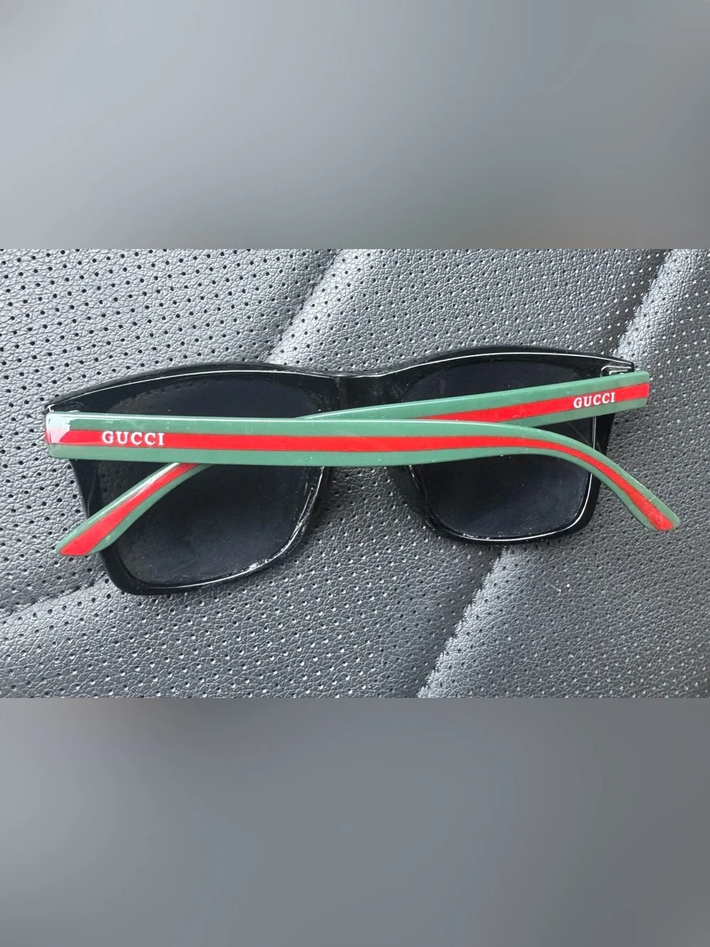 Black Sunglasses with Green and Red Stripe Detail and logo